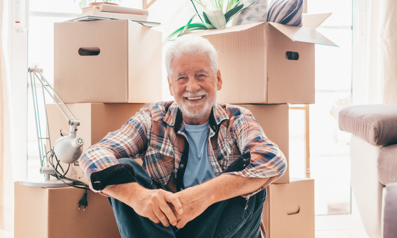 Senior reaching out to connect with neighbors, taking steps to avoid loneliness after relocating in retirement