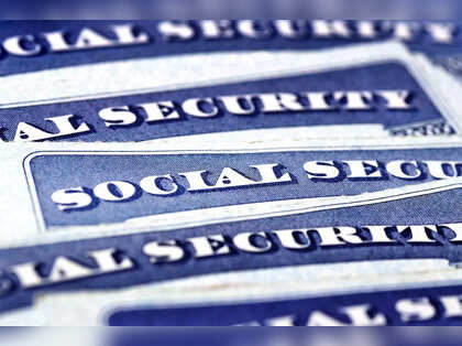 Multiple overlapping blue Social Security cards representing the major Social Security changes coming in 2026