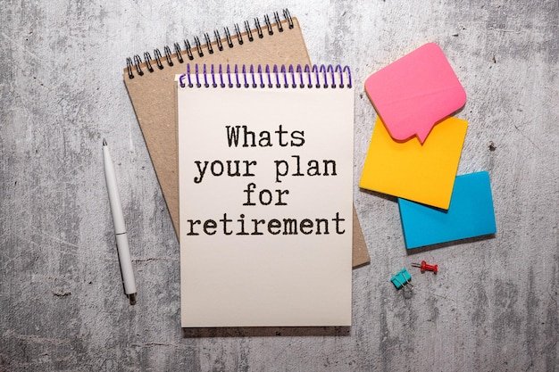 Notepad reading What is your plan for retirement surrounded by colorful sticky notes, representing the ultimate retirement to-do list