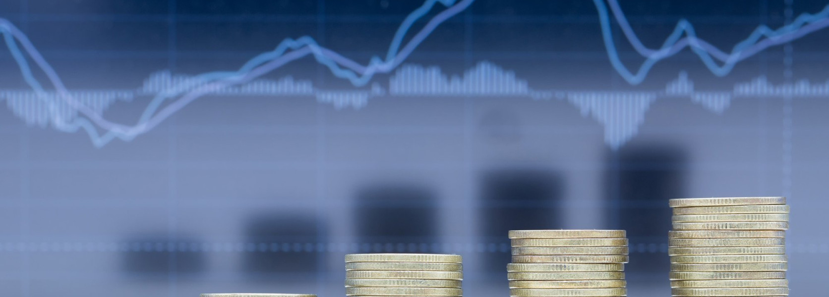 Five growing coin stacks in front of a market chart, representing investments converted into retirement income streams