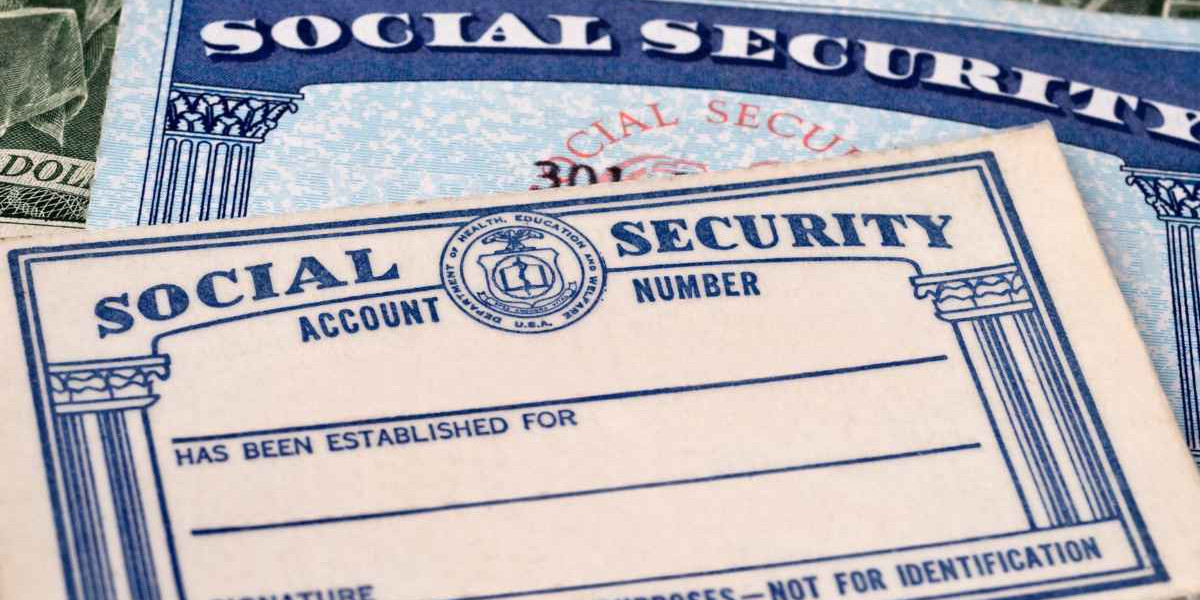 Two blank Social Security cards overlapping on U.S. currency, representing concerns about Social Security running out of funds